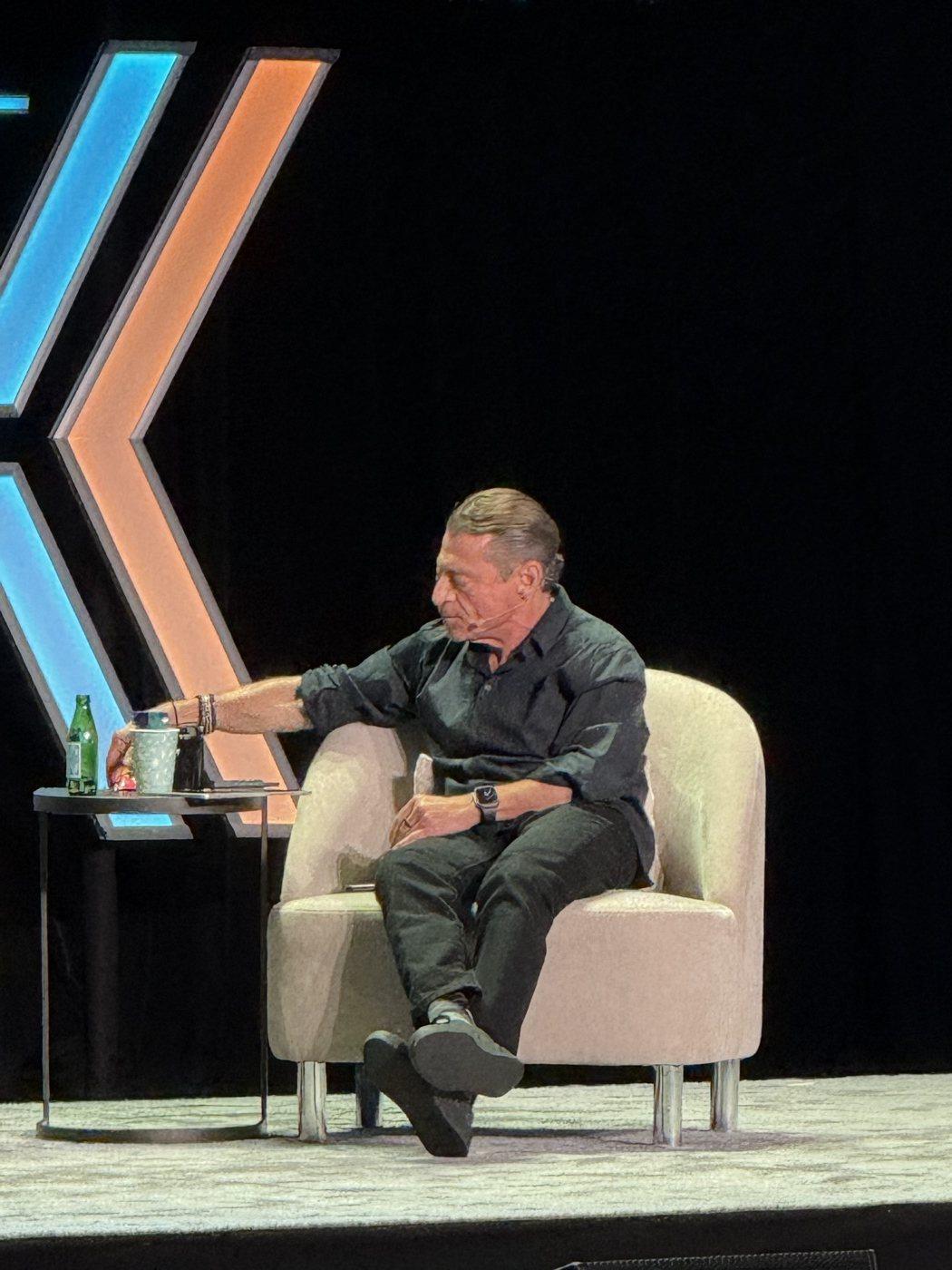 A speaker on the Moonshots Live stage at the United Theater.