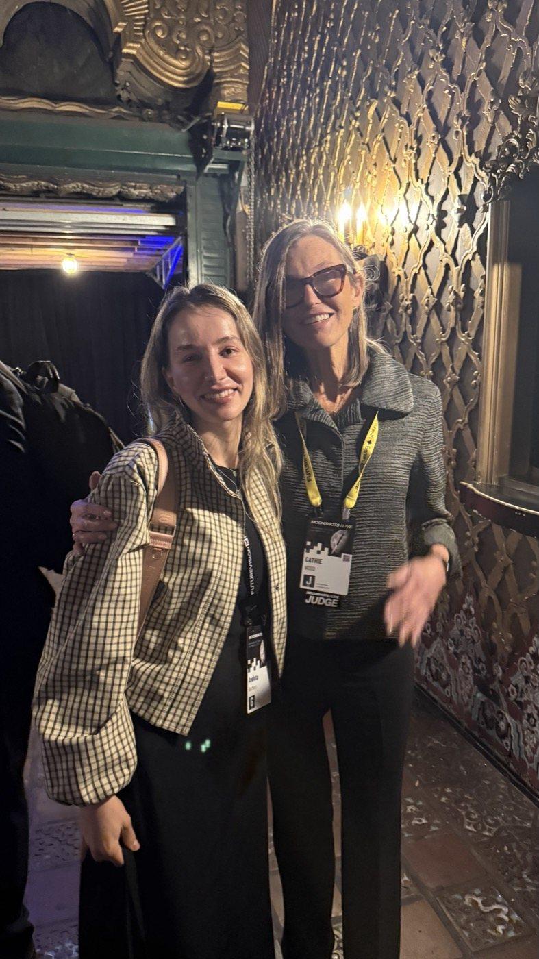 Anne Becheru with Cathie Wood, CEO and CIO of ARK Invest, in the lobby of the United Theater after the afternoon panel.