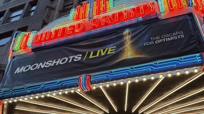 The United Theater marquee reads "Moonshots Live, The Oscars for Optimists", 25 September 2026.